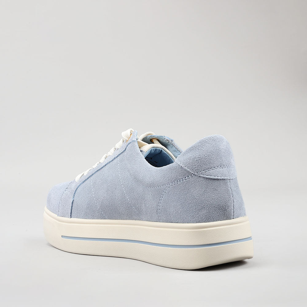 NAKED ARCHES Azealia Denim sneakers featuring blue denim and suede material, casual slip-on design, and stylish streetwear look