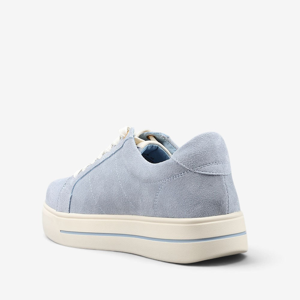 Naked Arches Azealia denim sneakers with suede accents, featuring a casual low-top design and lace-up closure.
