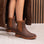 LOS CABOS Amelia chocolate boots in cinnamon color, showcasing stylish knee-high leather footwear with sleek design and stitching details.
