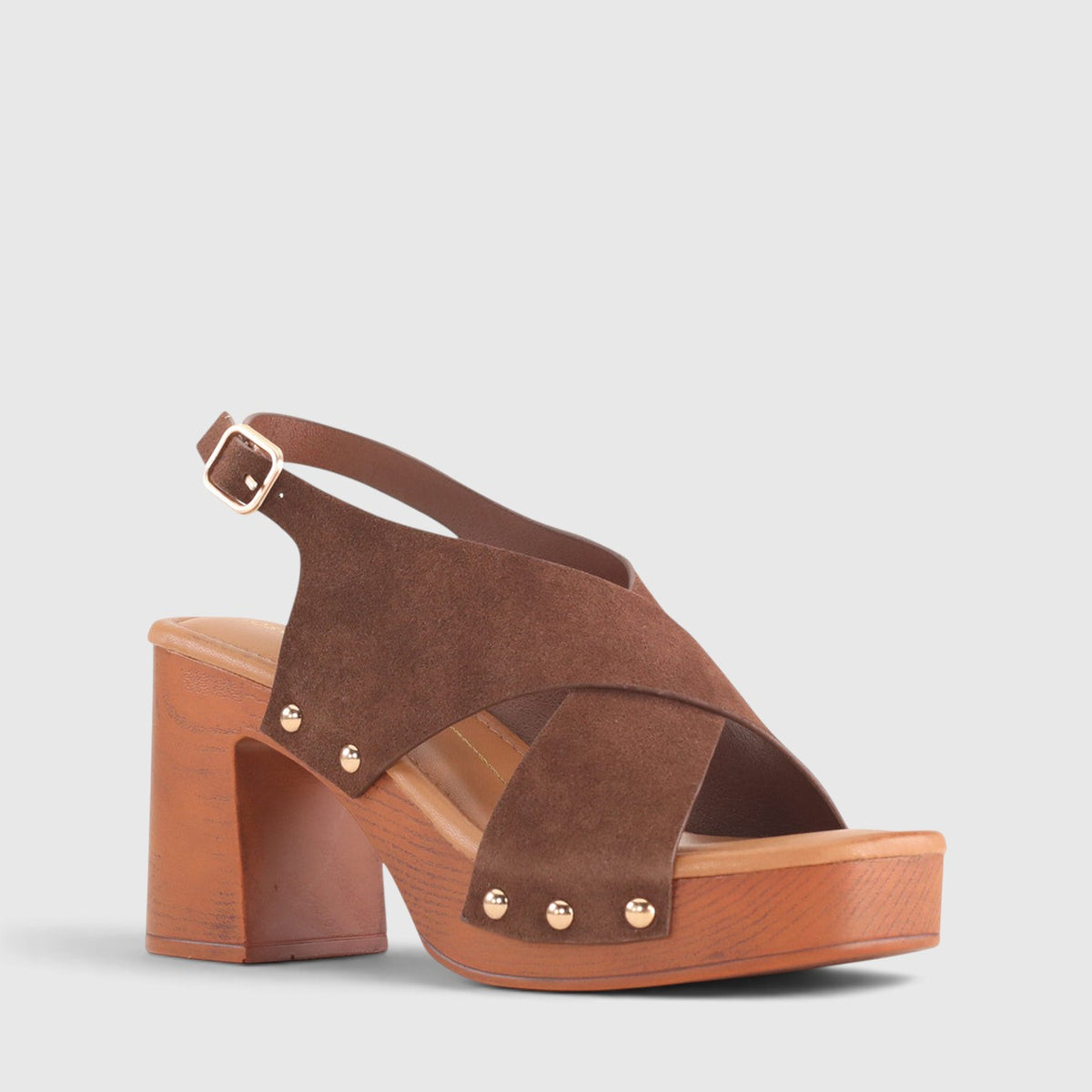 Los Cabos Anabella chestnut sandals featuring tan leather straps and a flat sole, displayed on a neutral background.