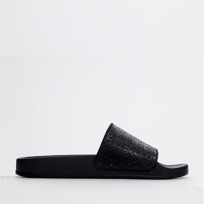 Black ALFIE & EVIE Billie slip-on shoes with a sleek design and comfortable fit, perfect for casual wear.