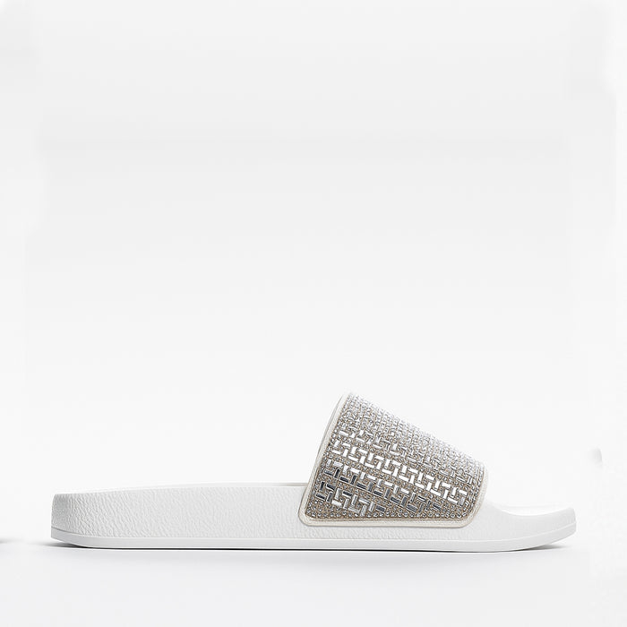 ALFIE & EVIE Billie white silver slip-on shoes with sleek design and metallic finish, perfect for casual and stylish wear.