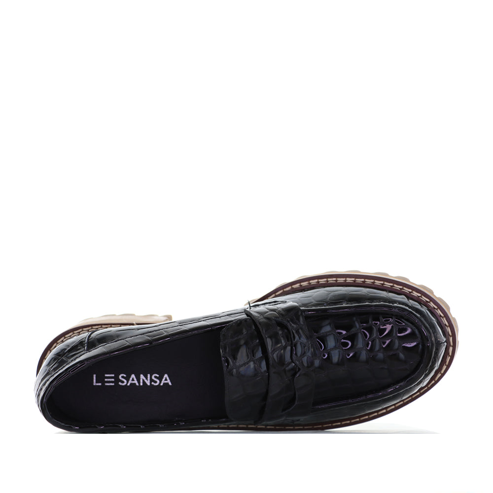 Le Sansa Zoey black croc casuals featuring textured black croc-patterned material and comfortable slip-on design.