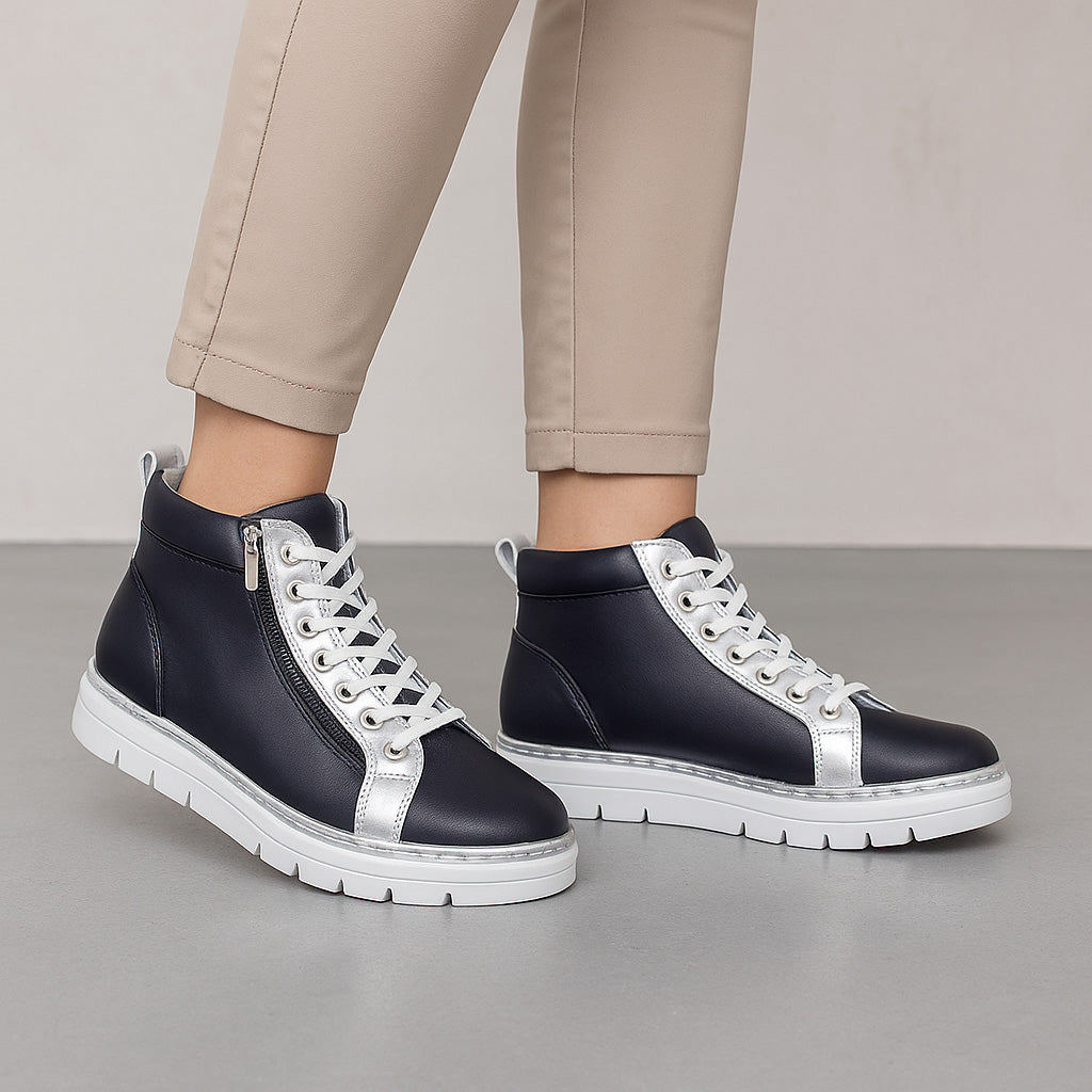 Le Sansa Bobby navy boots with silver accents, stylish ankle-length footwear featuring a sleek design and comfortable fit.