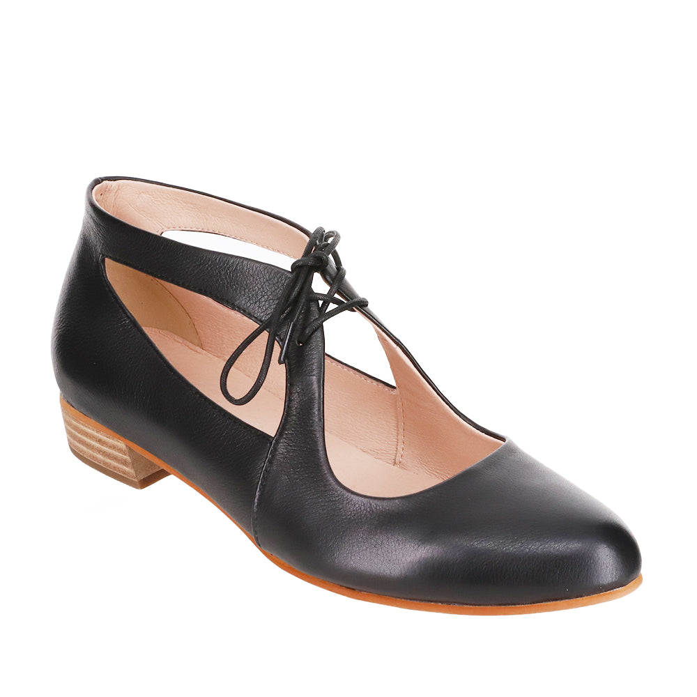 Le Sansa Boss Black sandals featuring sleek black straps and comfortable flat soles for stylish casual wear.