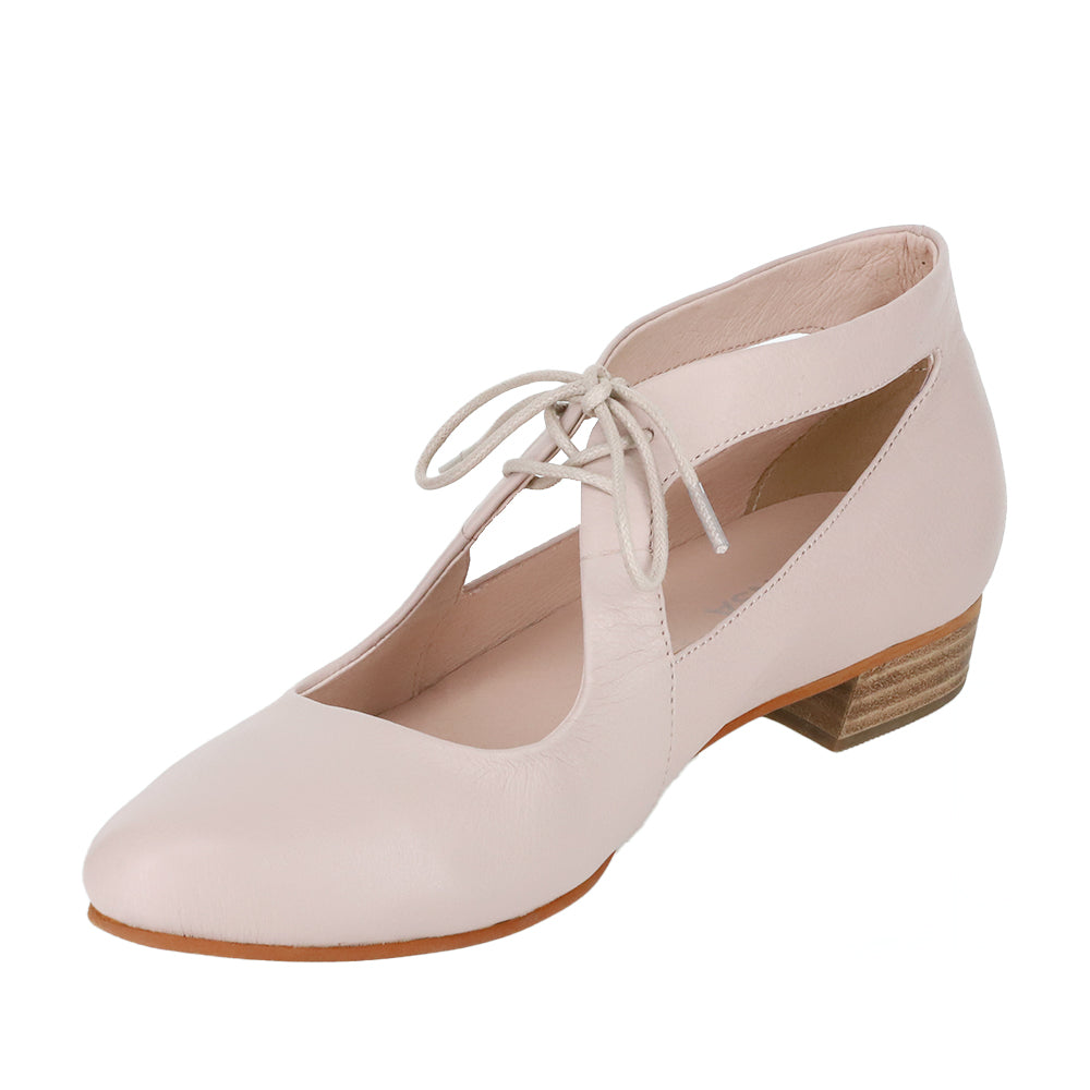 Le Sansa Boss blush sandals featuring a stylish design with blush-colored straps and comfortable flat soles.