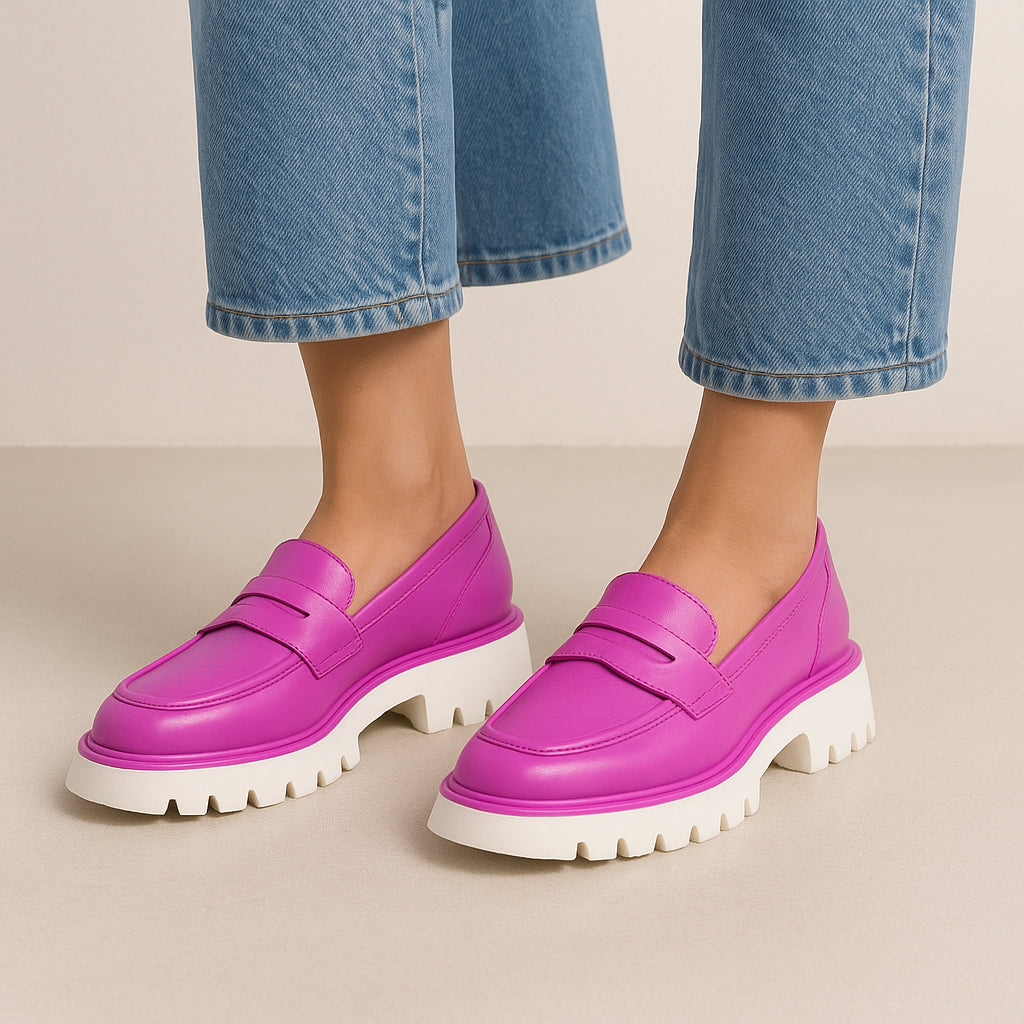 Le Sansa Bow Hot Pink loafers with decorative bow detail, stylish and vibrant footwear for casual or dressy occasions.