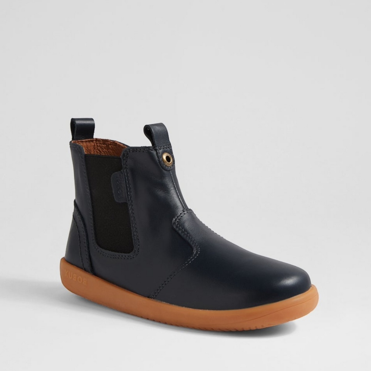 Baby Bobux Jodhpur Navy baby boots with soft leather and elastic side panels, designed for comfortable fit and stylish look.