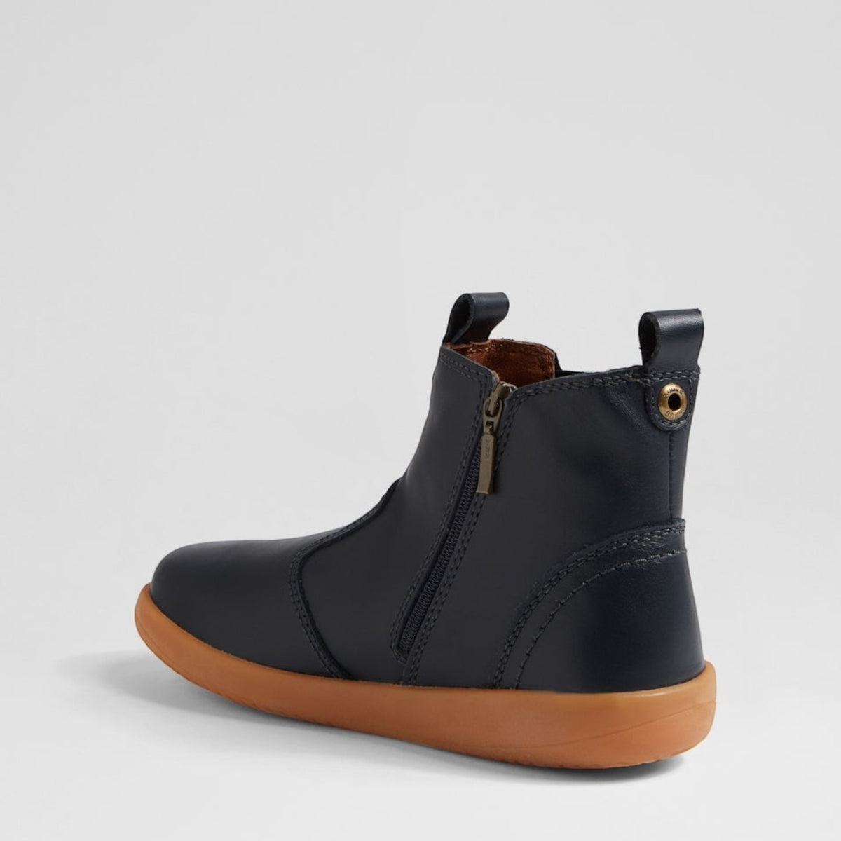 Baby Bobux Jodhpur navy baby boots with soft leather straps and stitching, designed for comfortable, stylish infant footwear.