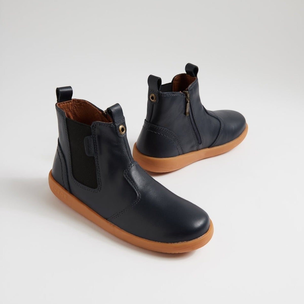 Baby Bobux Jodhpur Navy baby boots with navy leather and soft sole, designed for comfort and style for little feet.