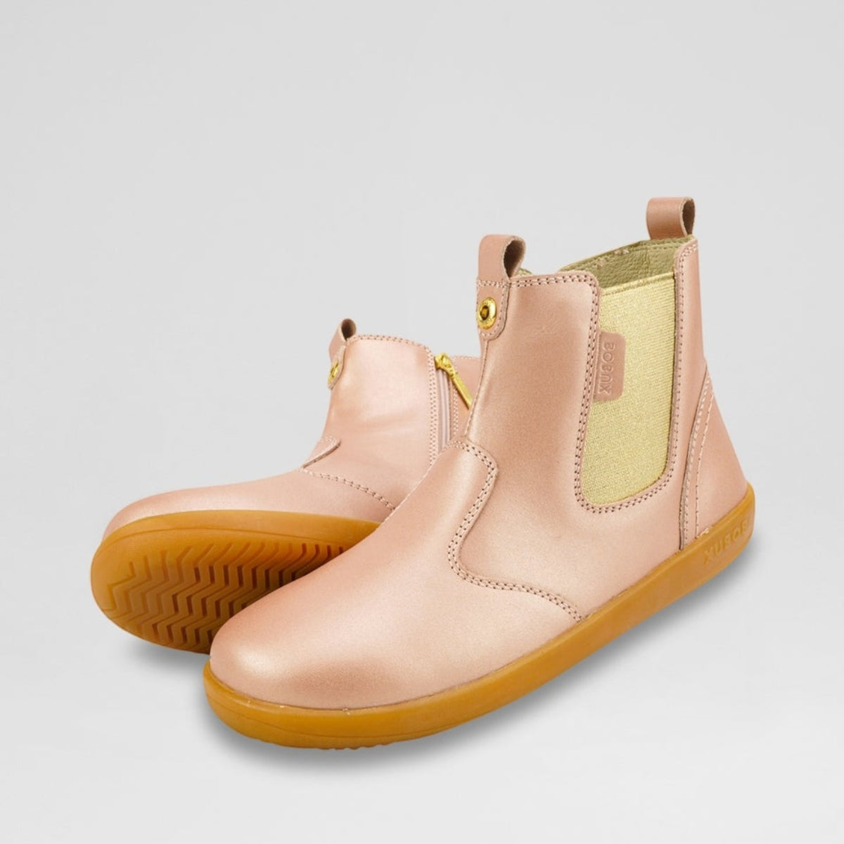 Baby Bobux Jodhpur rose gold baby boots with soft leather and stylish design, perfect for little ones.