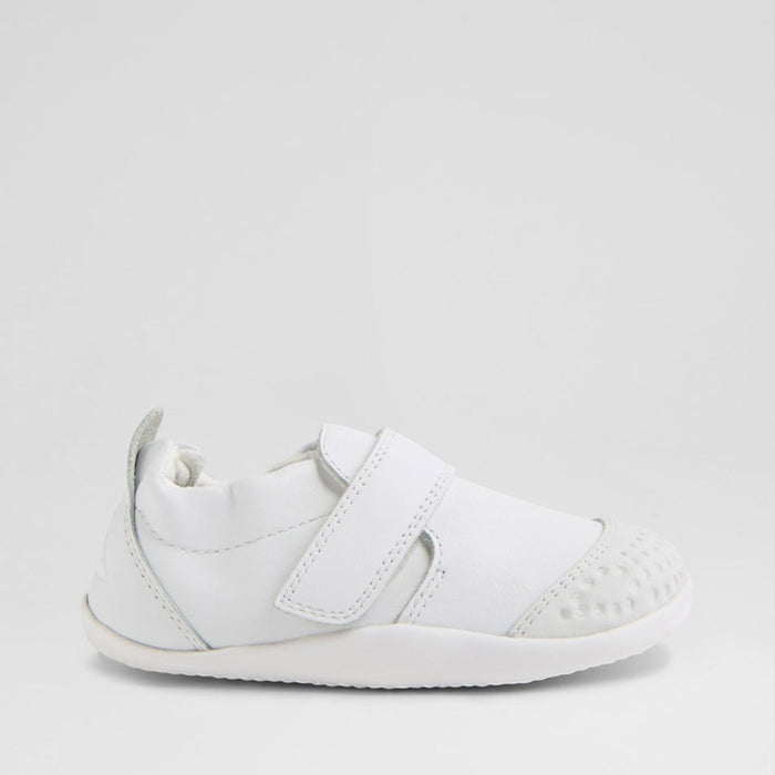 Baby sneakers from Bobux XP GO in white, featuring soft fabric and comfortable sole, ideal for early walkers.
