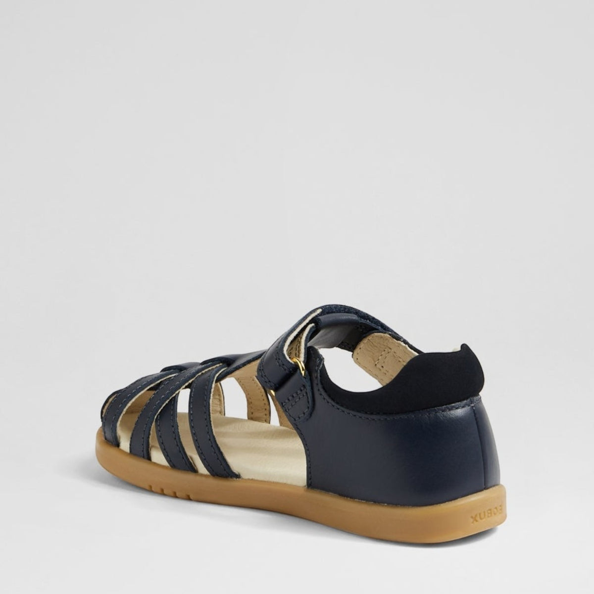Baby navy sandals from Bobux Cross Jump collection, featuring soft straps and flexible soles for comfortable toddler footwear.