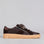 Brown EOS TINAH Mahogany sneakers with sleek design and white sole, showcasing comfortable casual footwear.