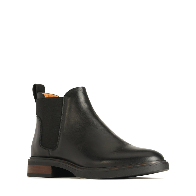 EOS Blaiz black boots shown from an angled view, featuring sleek design and stylish ankle height.