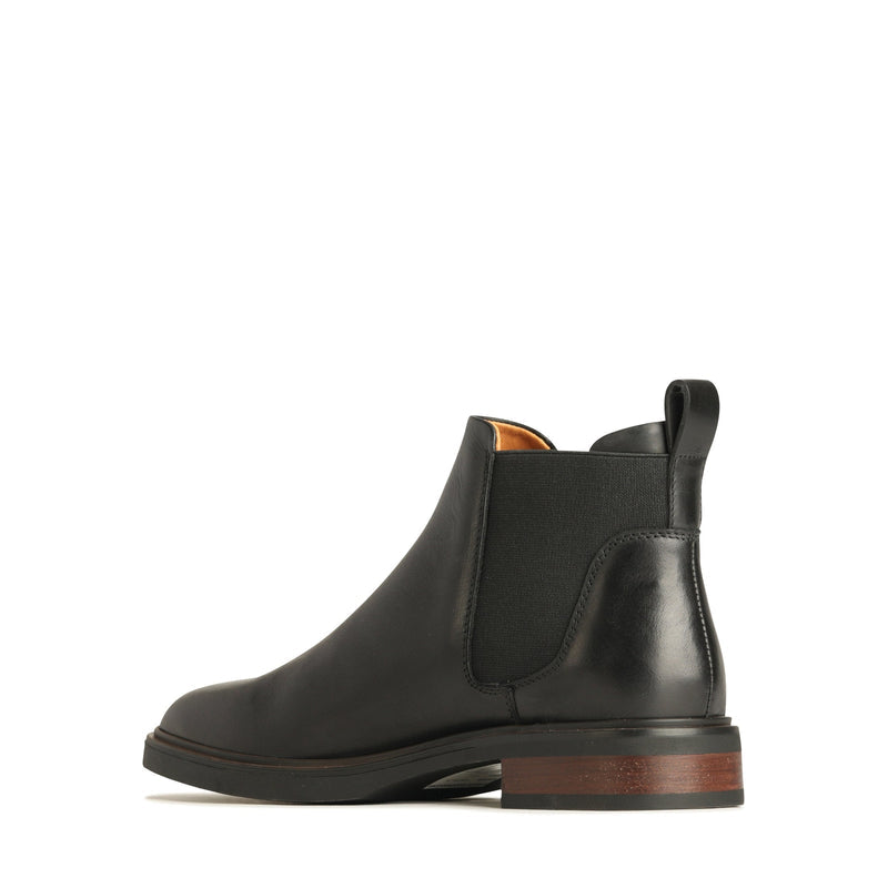 EOS Blaiz black boots, featuring sleek inside view with laces and stylish design, perfect for casual or urban wear.