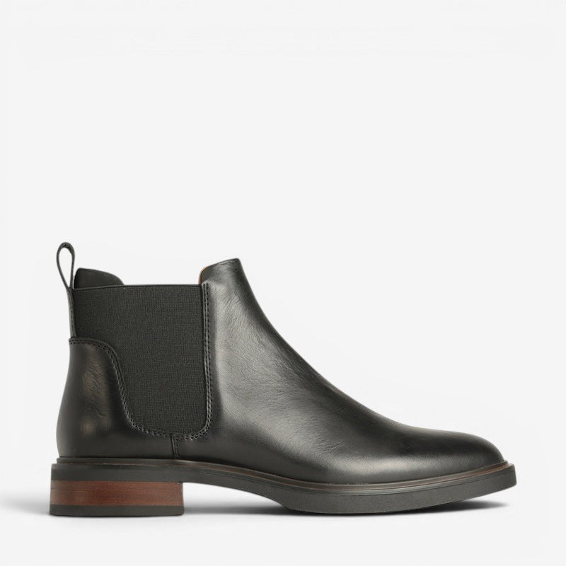 Black EOS Blaiz boots shown from outside view, featuring stylish design and sleek black leather finish.