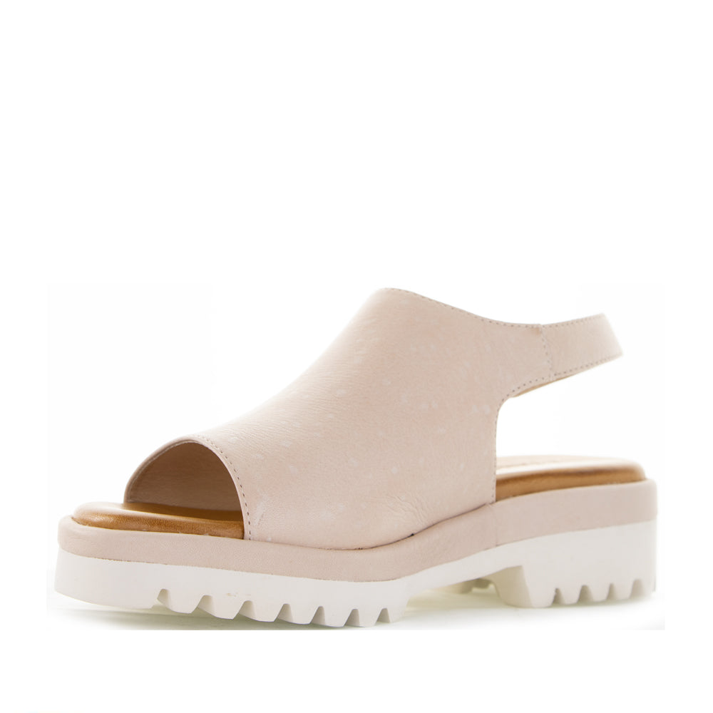 Le Sansa Briar Blush sandals with blush pink straps and flat sole, showcasing stylish and comfortable summer footwear.