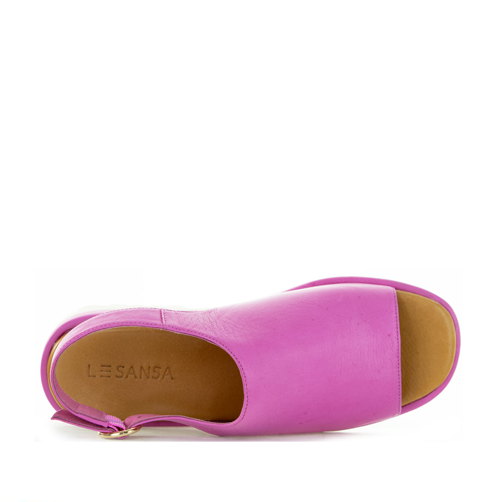 Le Sansa Briar Hot Pink sandals featuring open-toe design and ankle strap, stylish footwear for casual or summer wear.