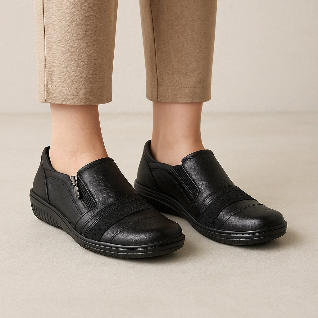 Black crinkle leather boots by Cabello, style CABELLO 5849-27, featuring a sleek design and ankle-high silhouette.