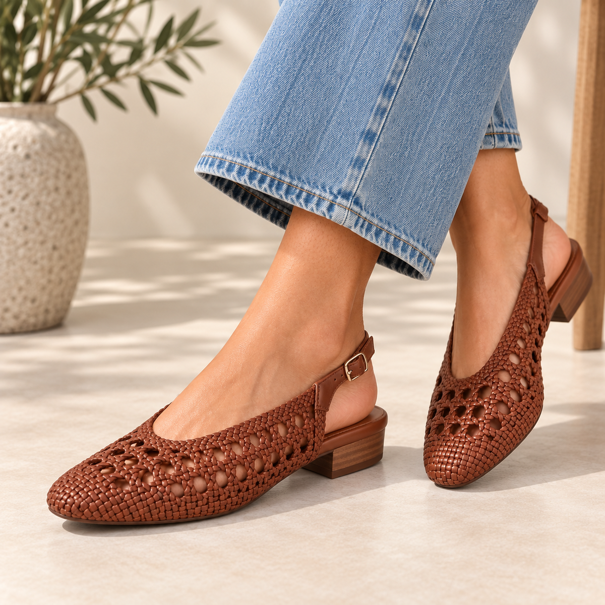 Le Sansa Camila walnut sandals featuring a stylish strap design and comfortable flat sole, perfect for casual wear.