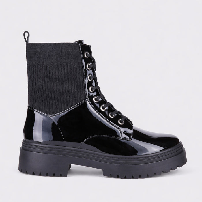 Black patent LE SANSA Candy boots with sleek design and rounded toe, stylish footwear by Le Sansa.