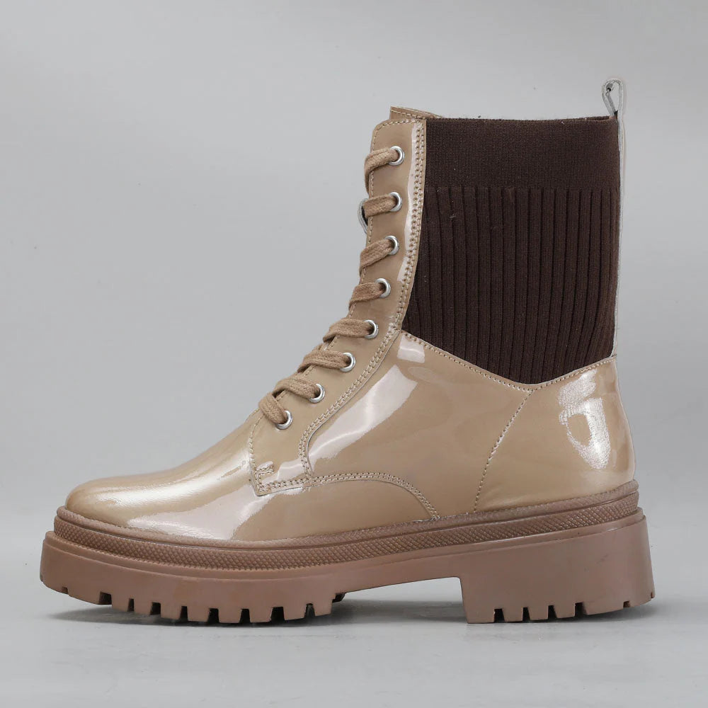 LE SANSA Candy Blush Patent Boots with chunky heel and sleek design, stylish footwear for casual or dressy occasions.