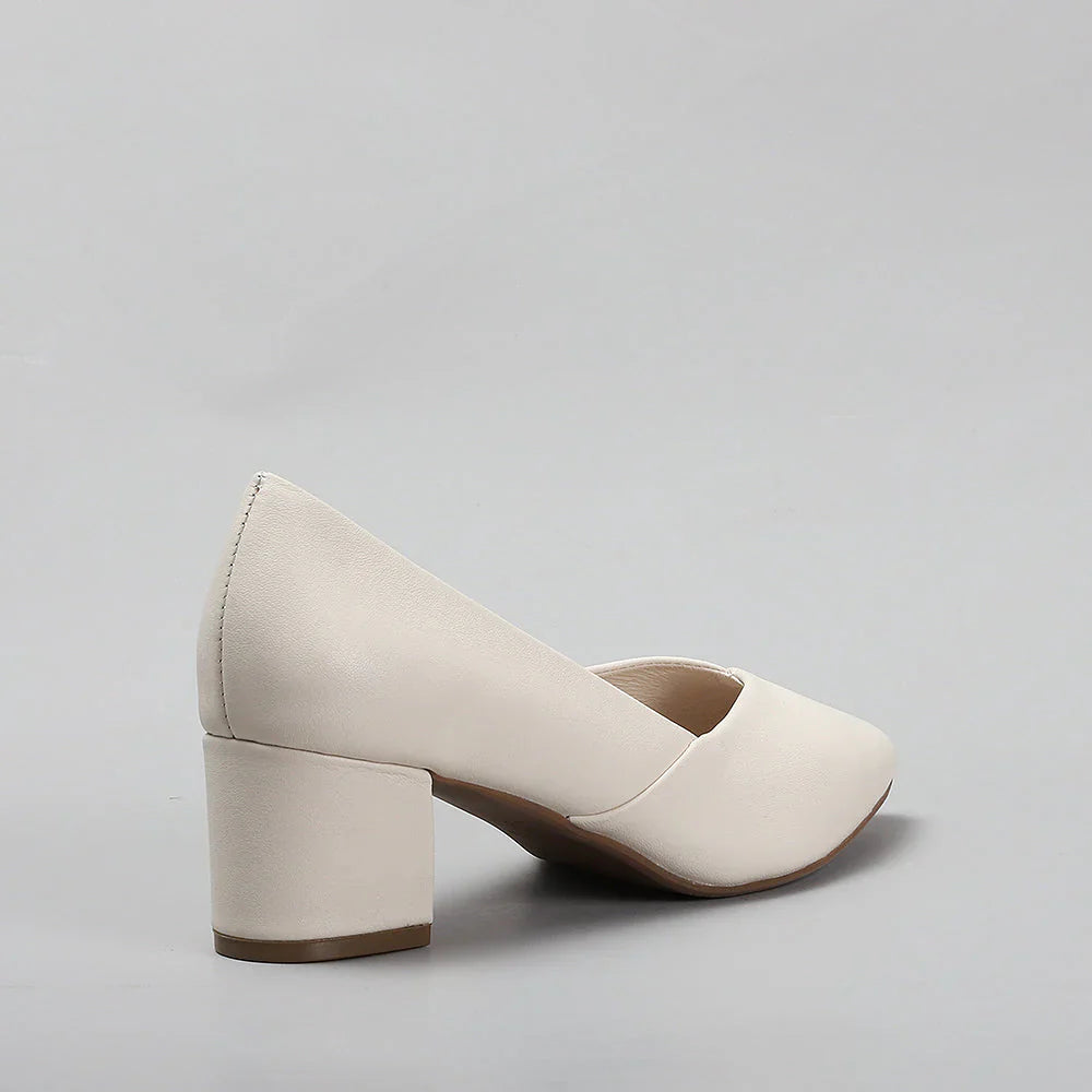 Le Sansa Carly Nude heels featuring a sleek design and nude color, perfect for stylish and elegant footwear.