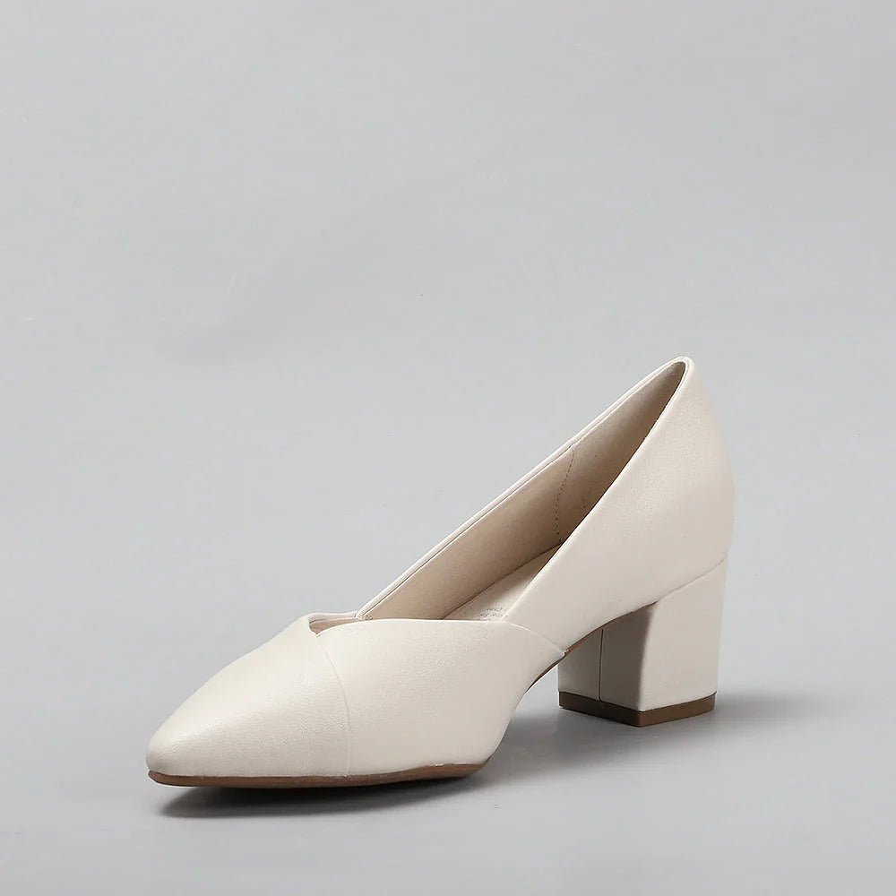 Le Sansa Carly Nude heels with a sleek design, showcasing the nude-colored leather and elegant heel detail.