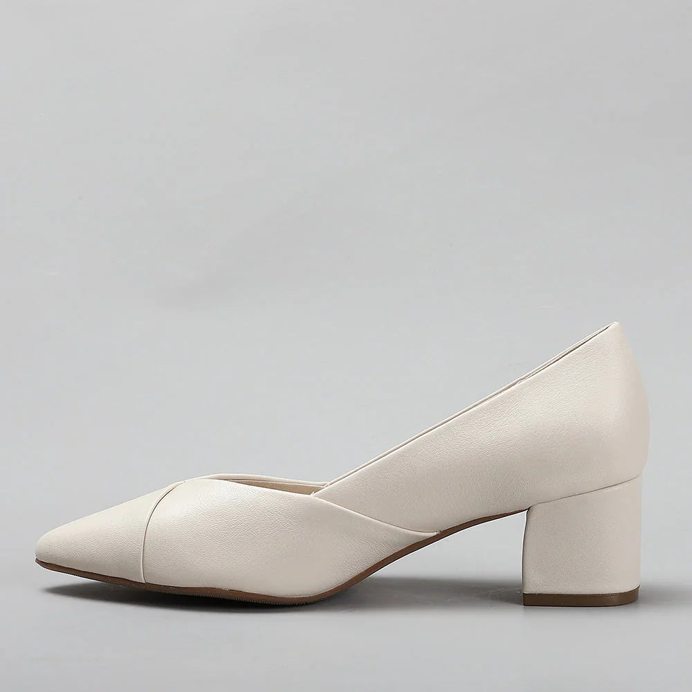 Le Sansa Carly Nude heels with open toe and stiletto heel, featuring a sleek nude design and elegant ankle strap.