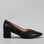 Le Sansa Carly black heels shown from the side, featuring sleek design and pointed toe, perfect for stylish footwear.