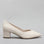 Le Sansa Carly Nude heels shown from the side, featuring a sleek design and nude color perfect for elegant footwear.