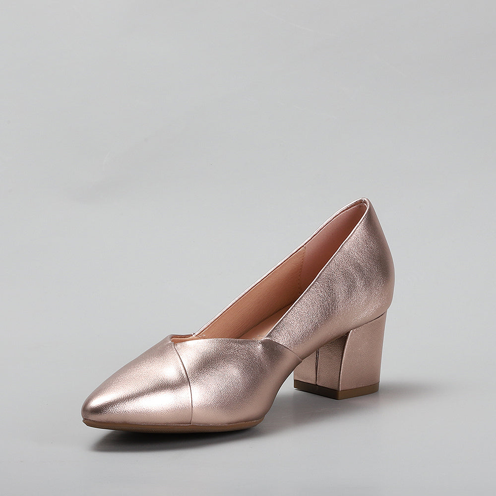 Le Sansa Carly Rose Gold heels with slim straps and stiletto heels, shown in a stylish South West setting.