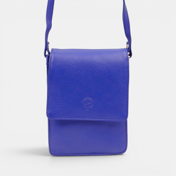 Second Nature cobalt handbag featuring sleek design, structured shape, and silver hardware, perfect for stylish everyday use.
