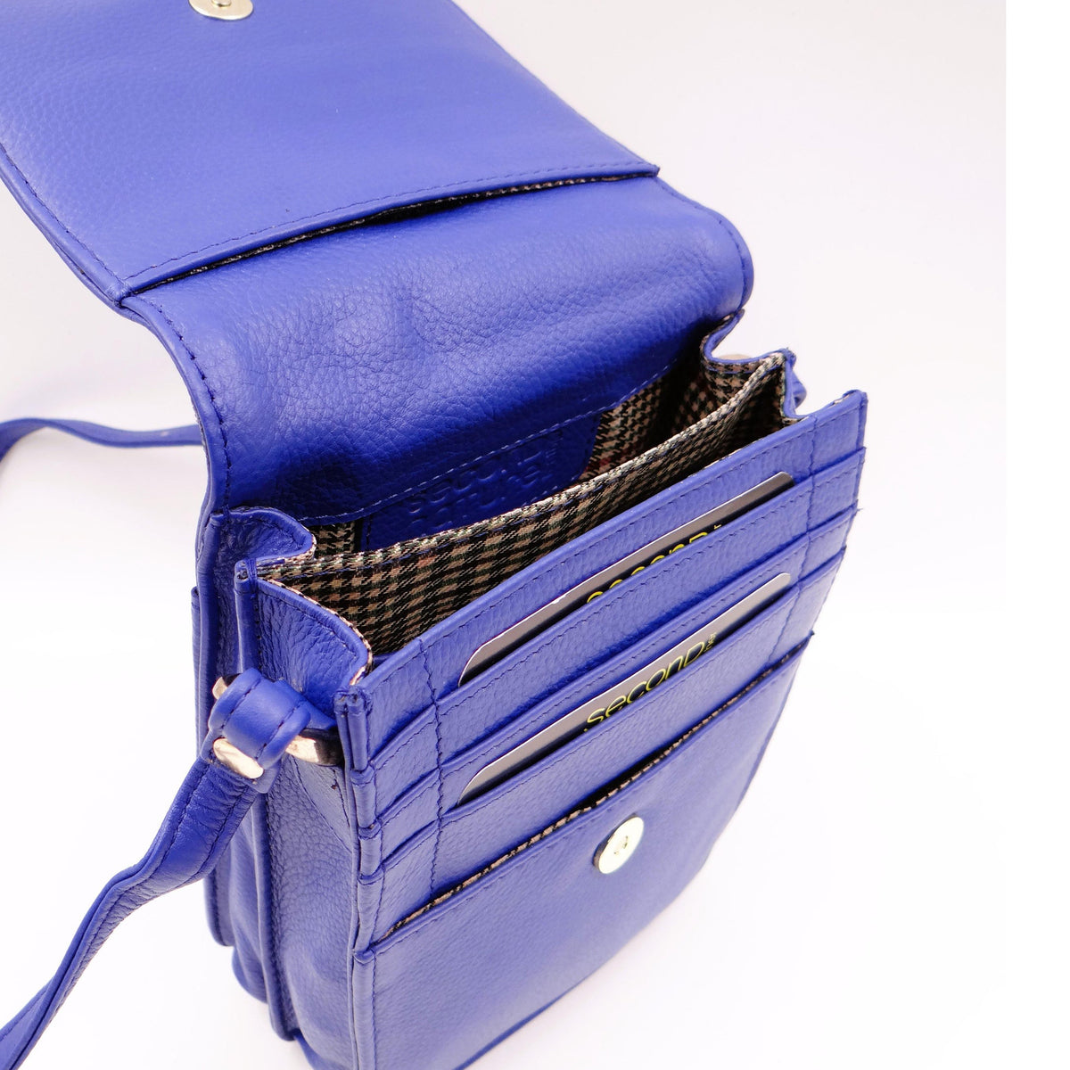 Second Nature CB6 cobalt handbag with structured design and silver hardware, made from textured leather.