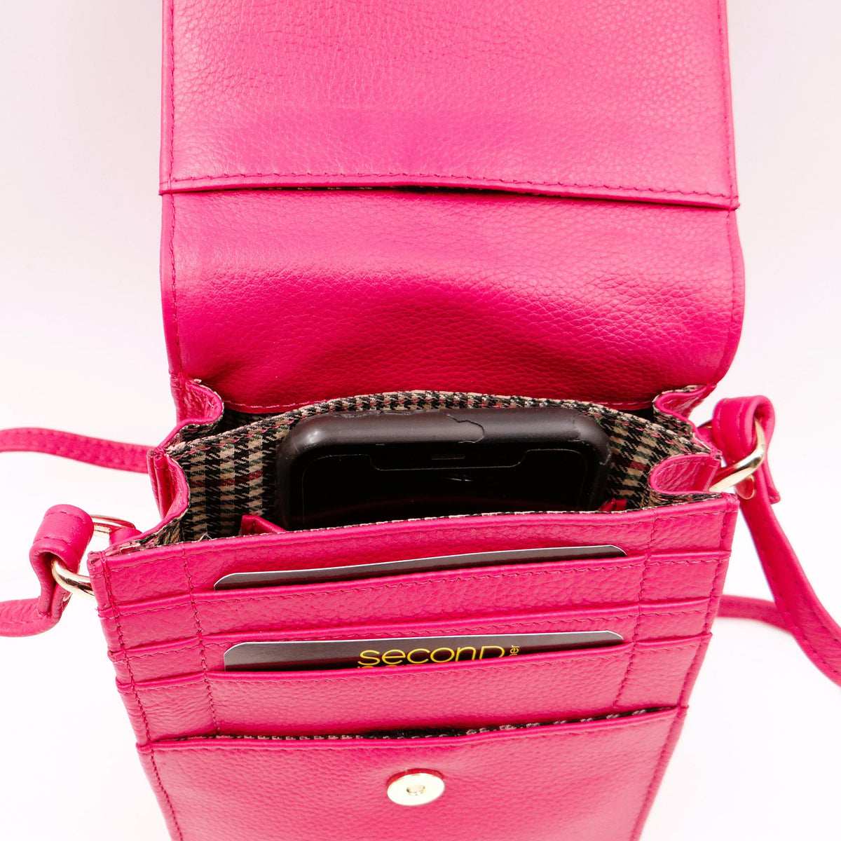 Second Nature CB6 Fuchsia handbag with a vibrant fuchsia color and stylish design, featuring handles and detailed craftsmanship.