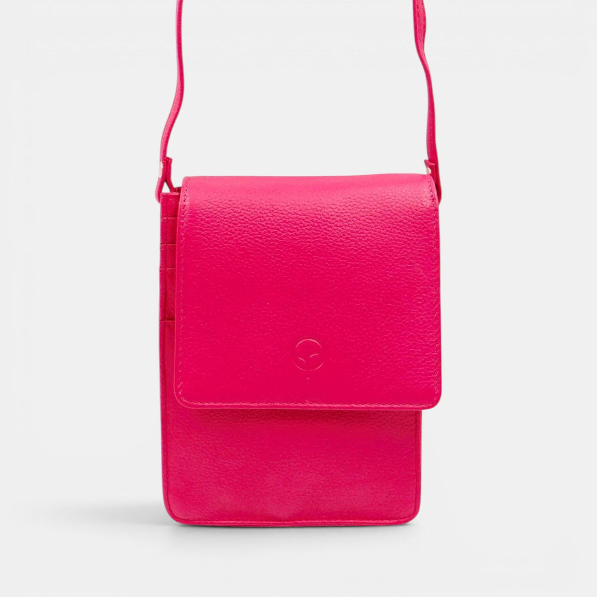 Second Nature CB6 Fuchsia handbag with a vibrant fuchsia color and sleek design, featuring a structured shape and top handles.