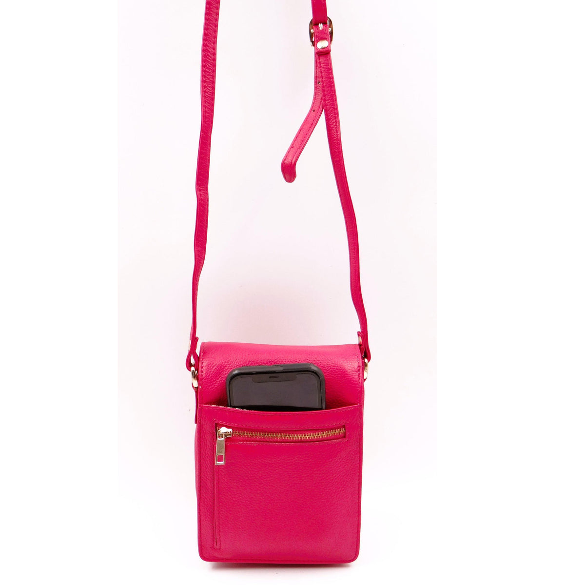 Second Nature CB6 Fuchsia handbag with a vibrant pink leather exterior and stylish design, featuring a top handle and metal accents.