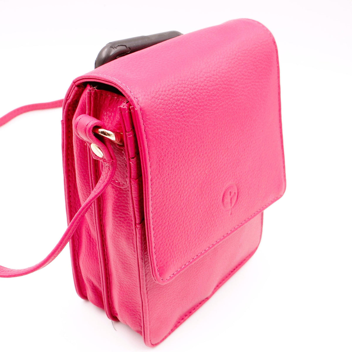 Second Nature CB6 Fuchsia handbag with sleek design, vibrant pink color, and minimalist style, featuring a top handle and silver hardware.