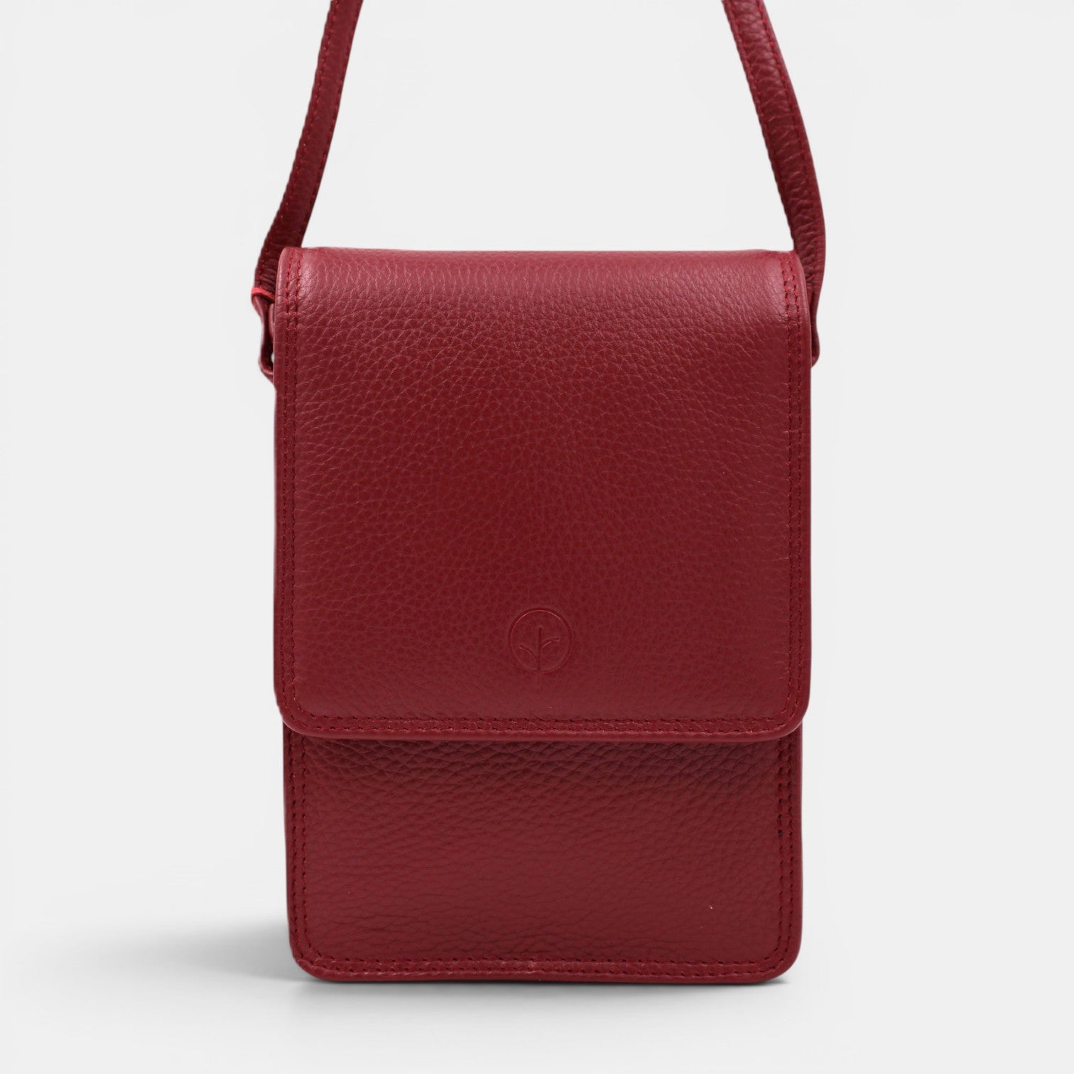 Second Nature CB6 Merlot handbag with structured design and top handle, featuring a smooth leather finish in rich merlot color.
