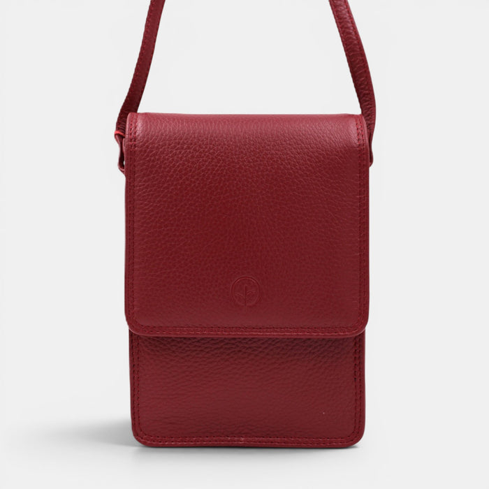 Second Nature CB6 Merlot handbag with structured design and top handle, featuring a smooth leather finish in rich merlot color.