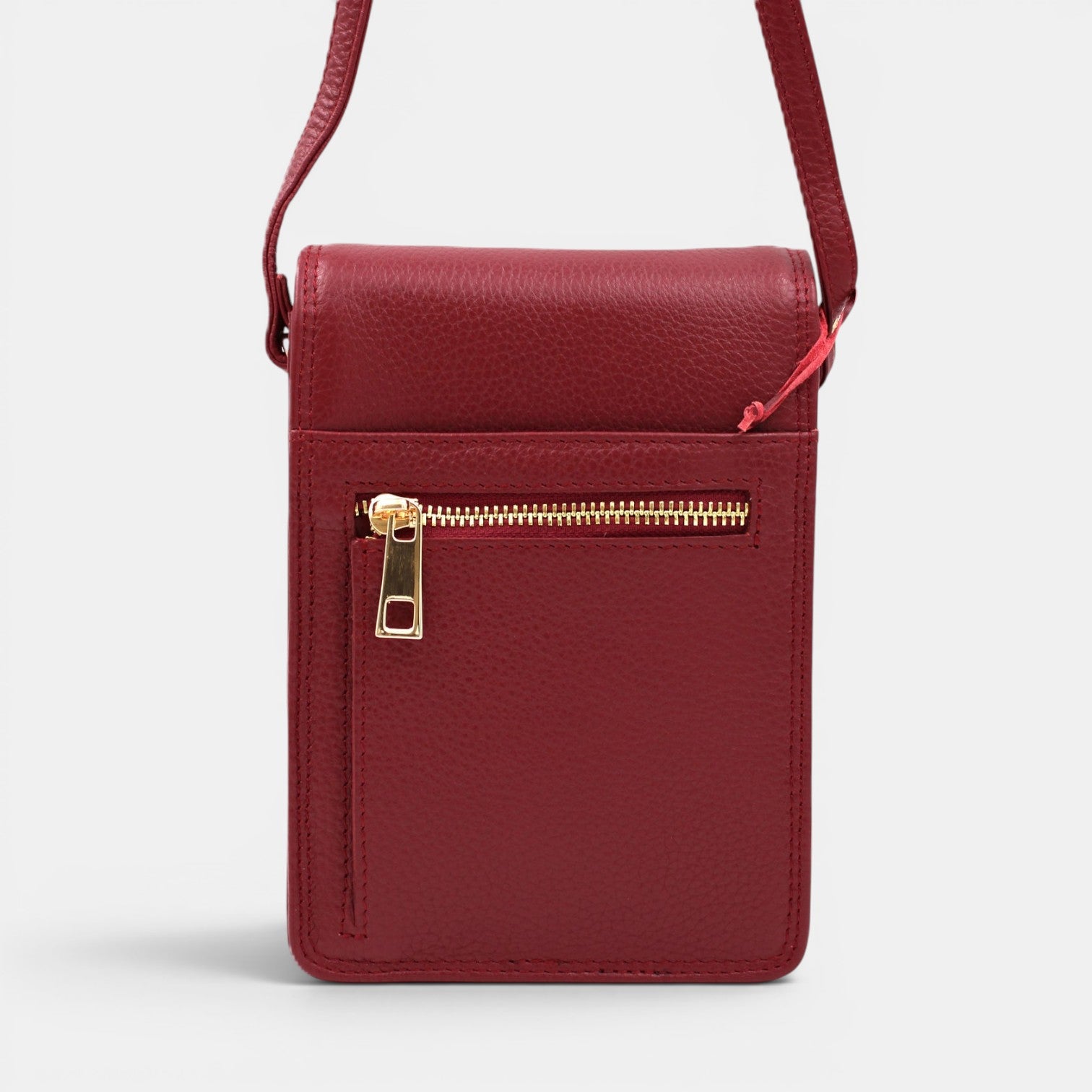 Second Nature CB6 Merlot handbag with sleek design and smooth leather finish, featuring a top handle and subtle branding.