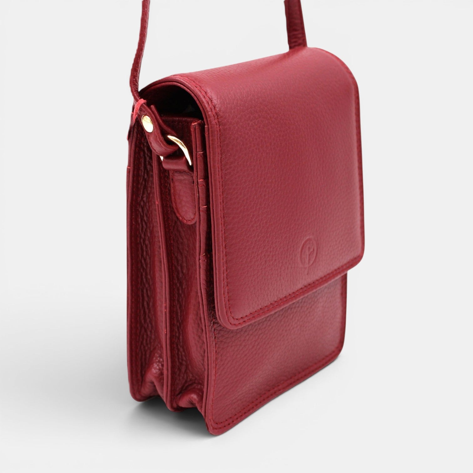 Second Nature CB6 Merlot handbag with sleek design, featuring a smooth leather texture and elegant shape.