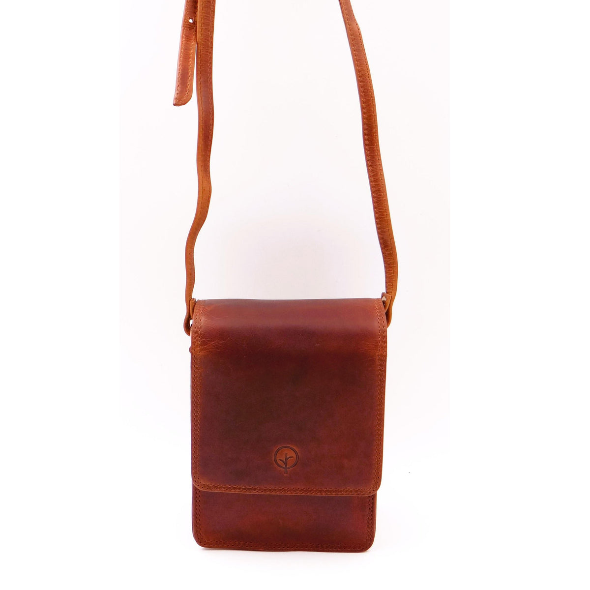 Second Nature CB6 tan handbag with metal accents, featuring a sleek design and spacious interior for everyday use.