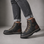 Black CC Resorts Grease Boots with rugged leather design and sturdy soles, perfect for outdoor wear.