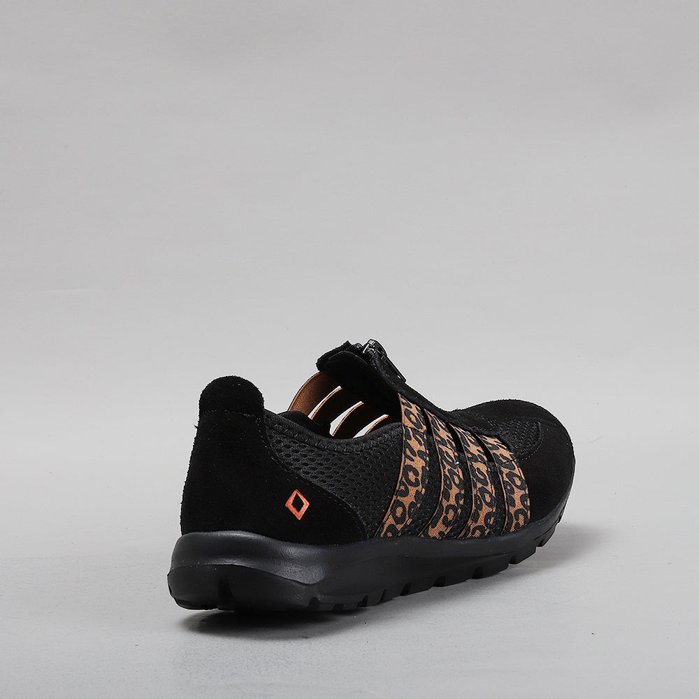 CC Resorts Christine black leopard casuals with stylish leopard print design and comfortable slip-on style.