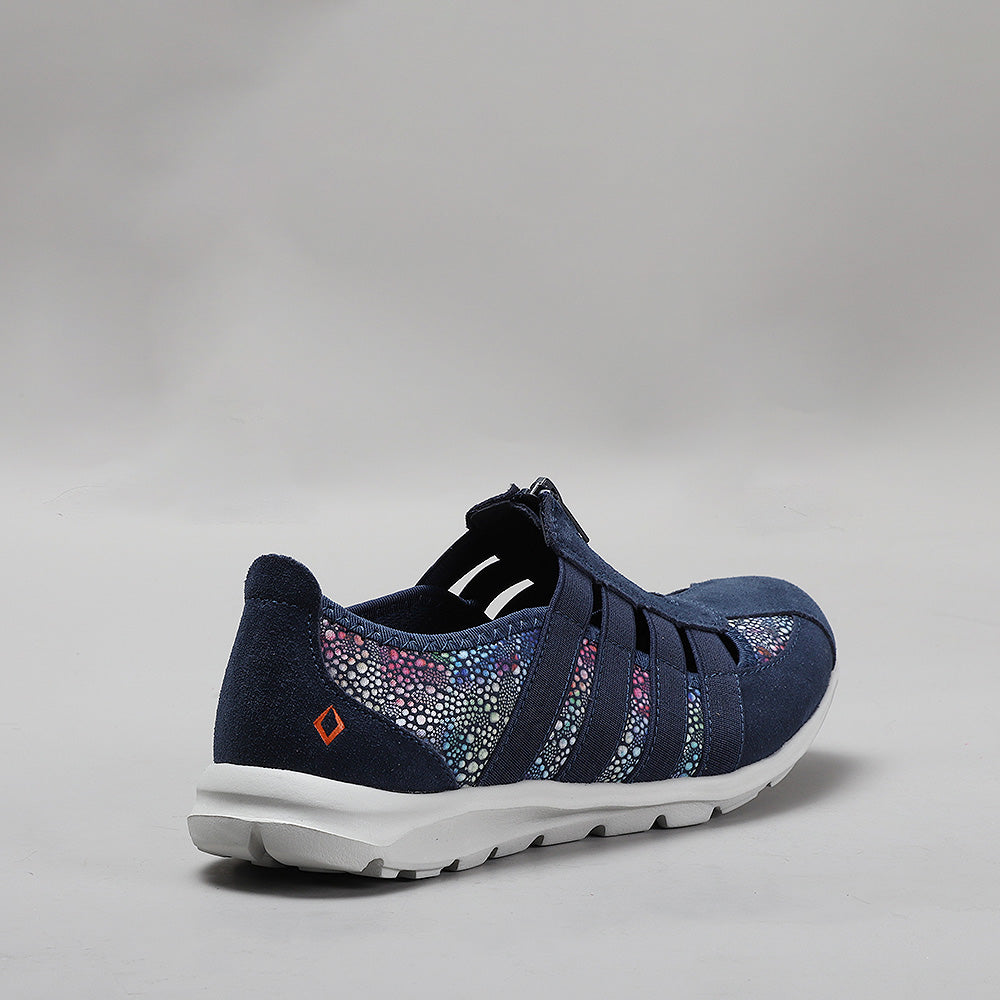CC Resorts Christine Navy Floral casuals showing navy fabric with colorful floral pattern and comfortable slip-on design