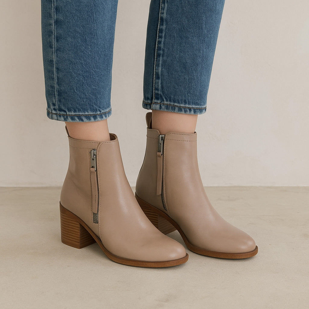 EOS Ciara taupe boots featuring a sleek design, pointed toe, and ankle-high style perfect for casual or chic outfits.