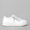 White LE SANSA CLARA sneakers with side view, showcasing stylish design and comfortable fit for casual wear.