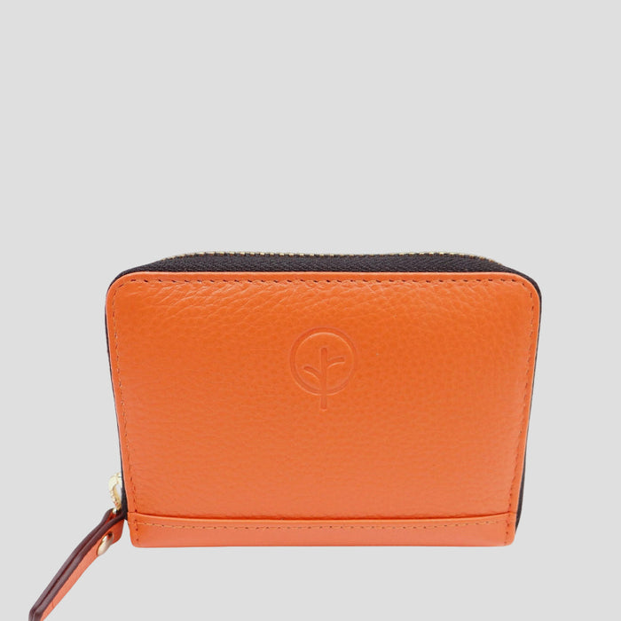 Orange leather wallet by Second Nature featuring multiple card slots and a sleek design.